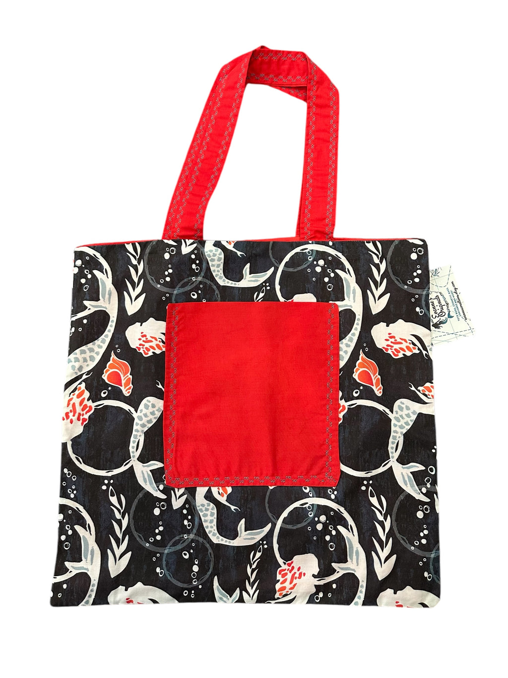 Mermaid swimming design on a tote bag