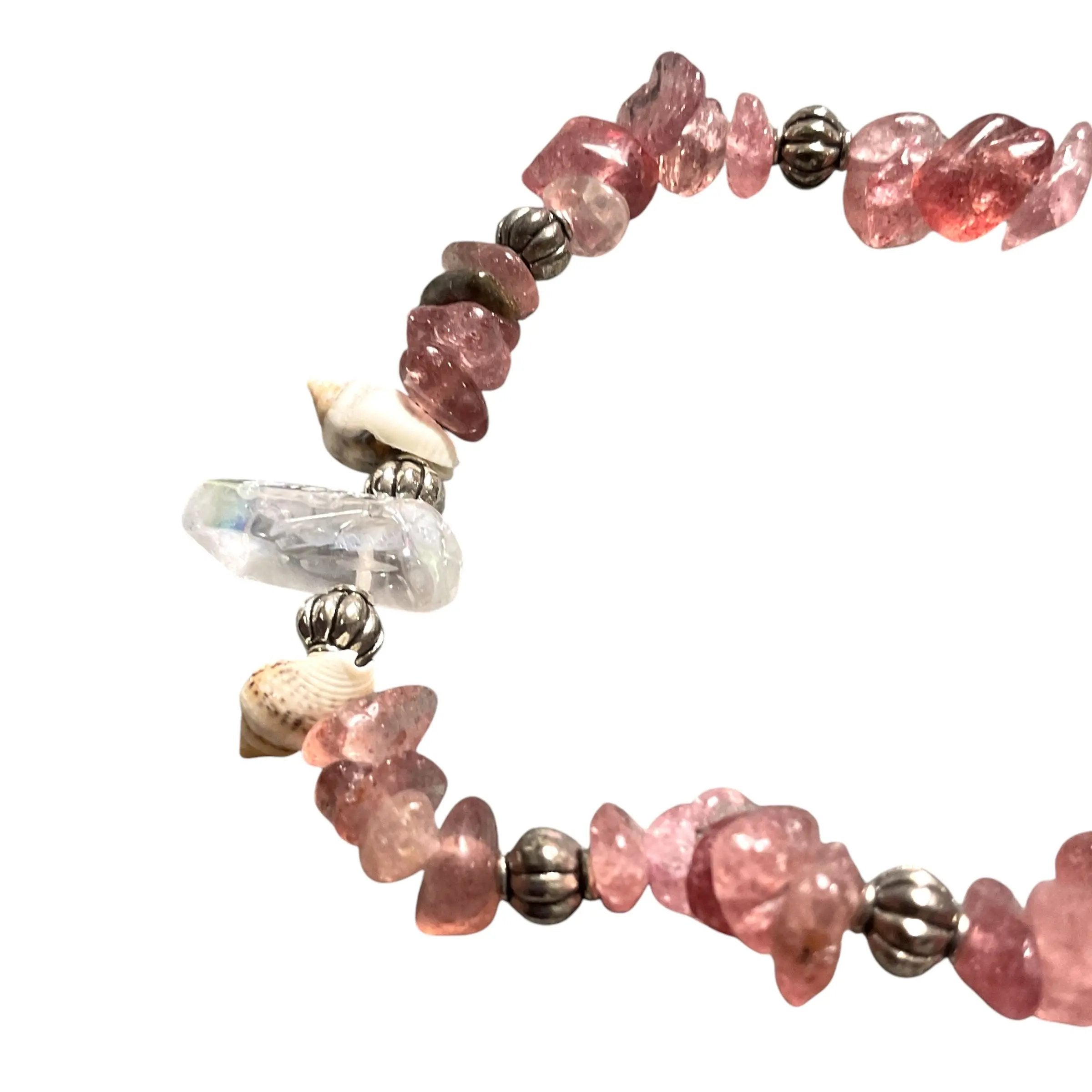 Necklace with pink and clear beads on a white background