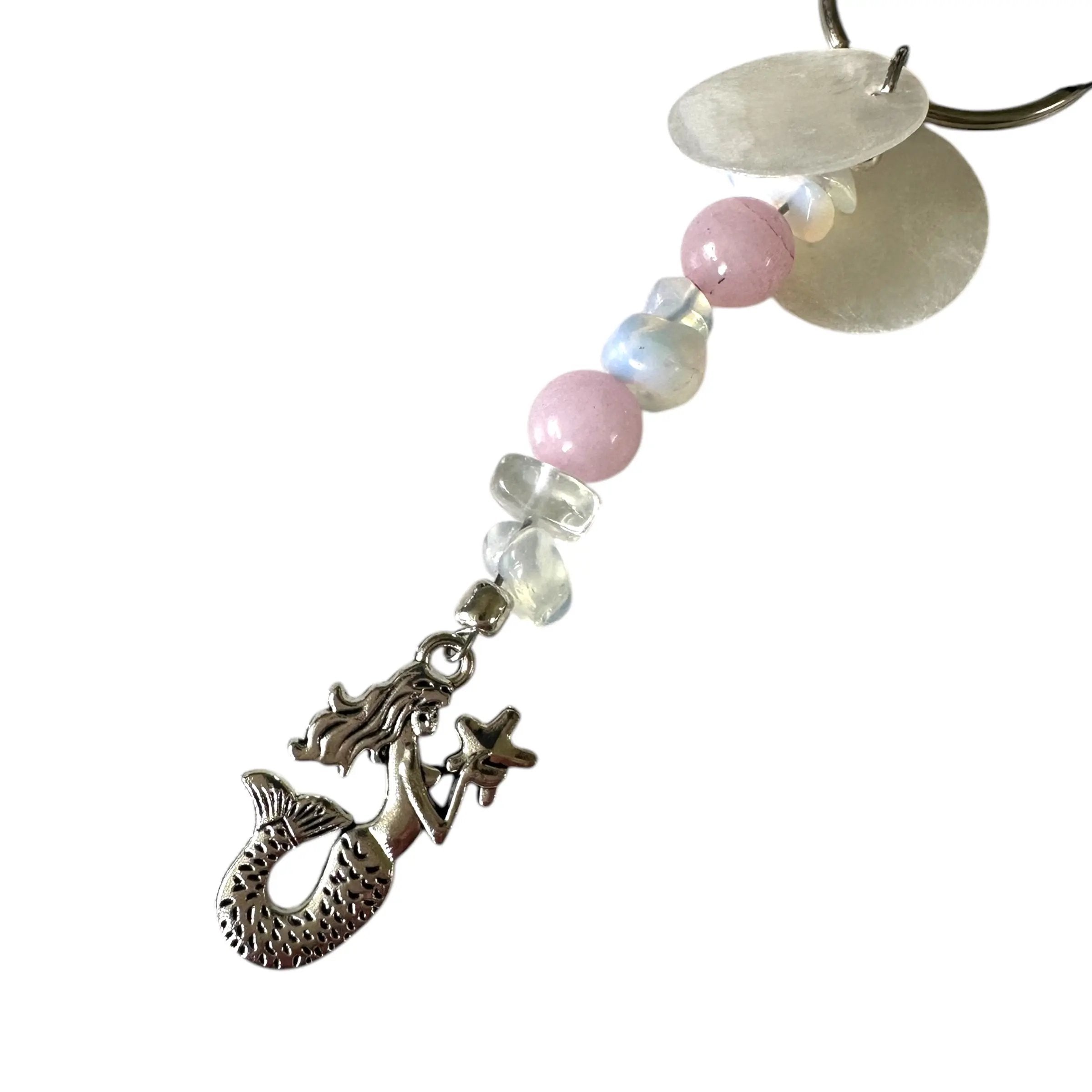 Keychain with mermaid charm, pink beads, and seashell on a white background