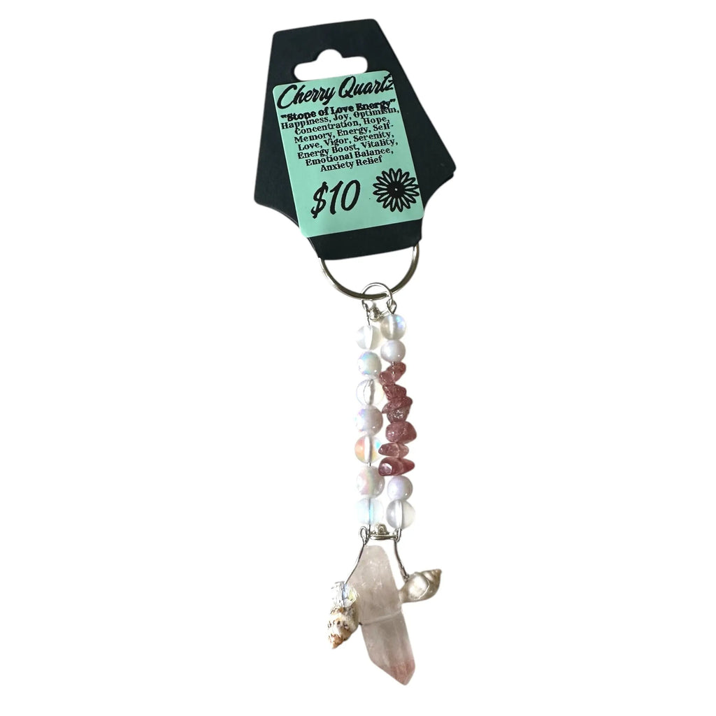 Cherry Quartz crystal keychain on a white background