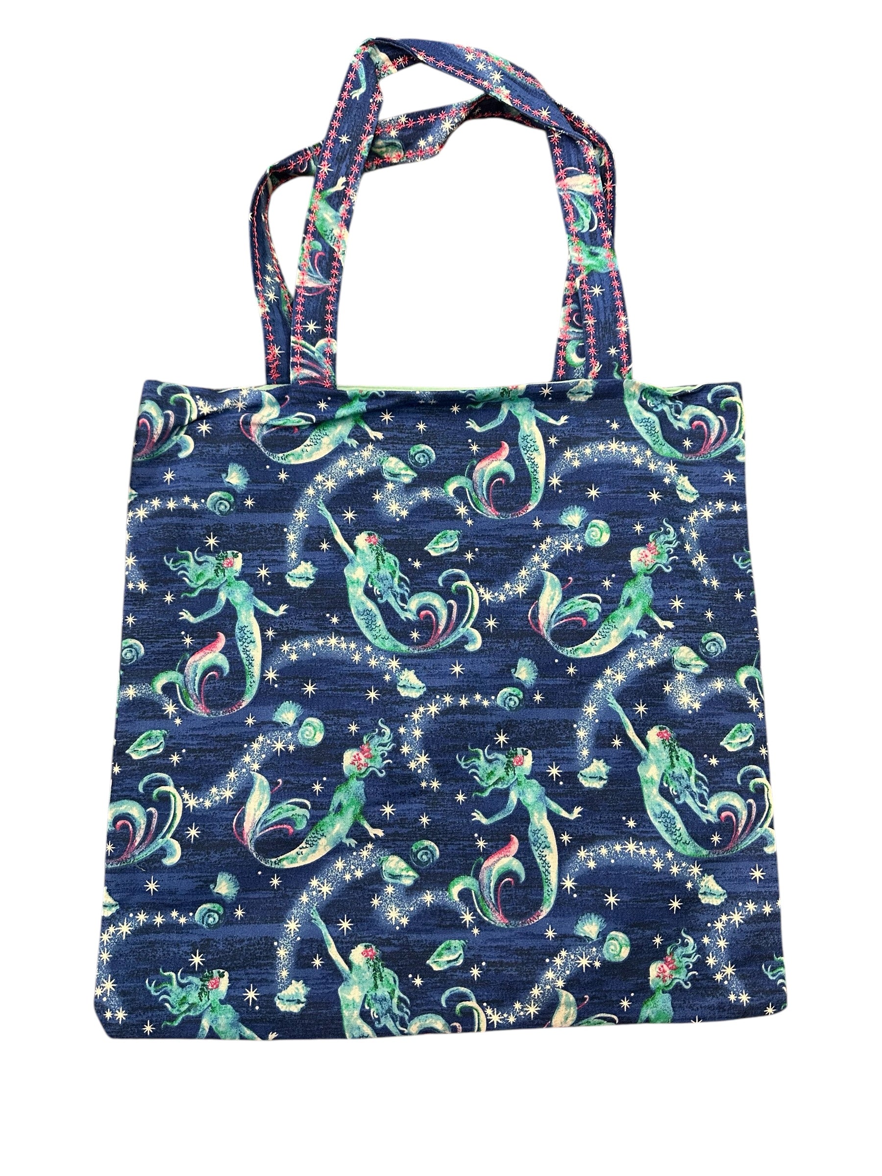 Tote bag with mermaid pattern on a blue background