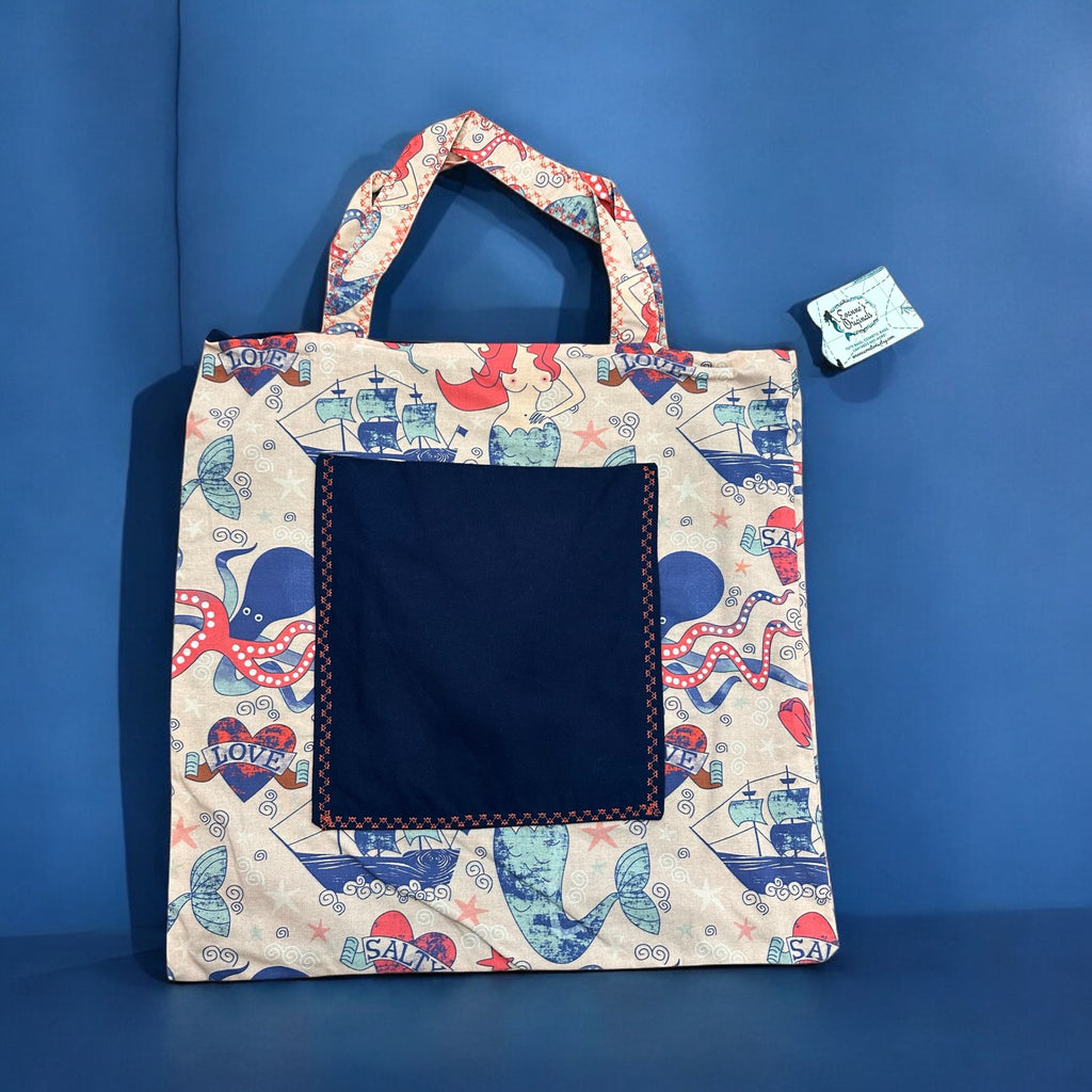 Tote bag with colorful pattern on a blue background