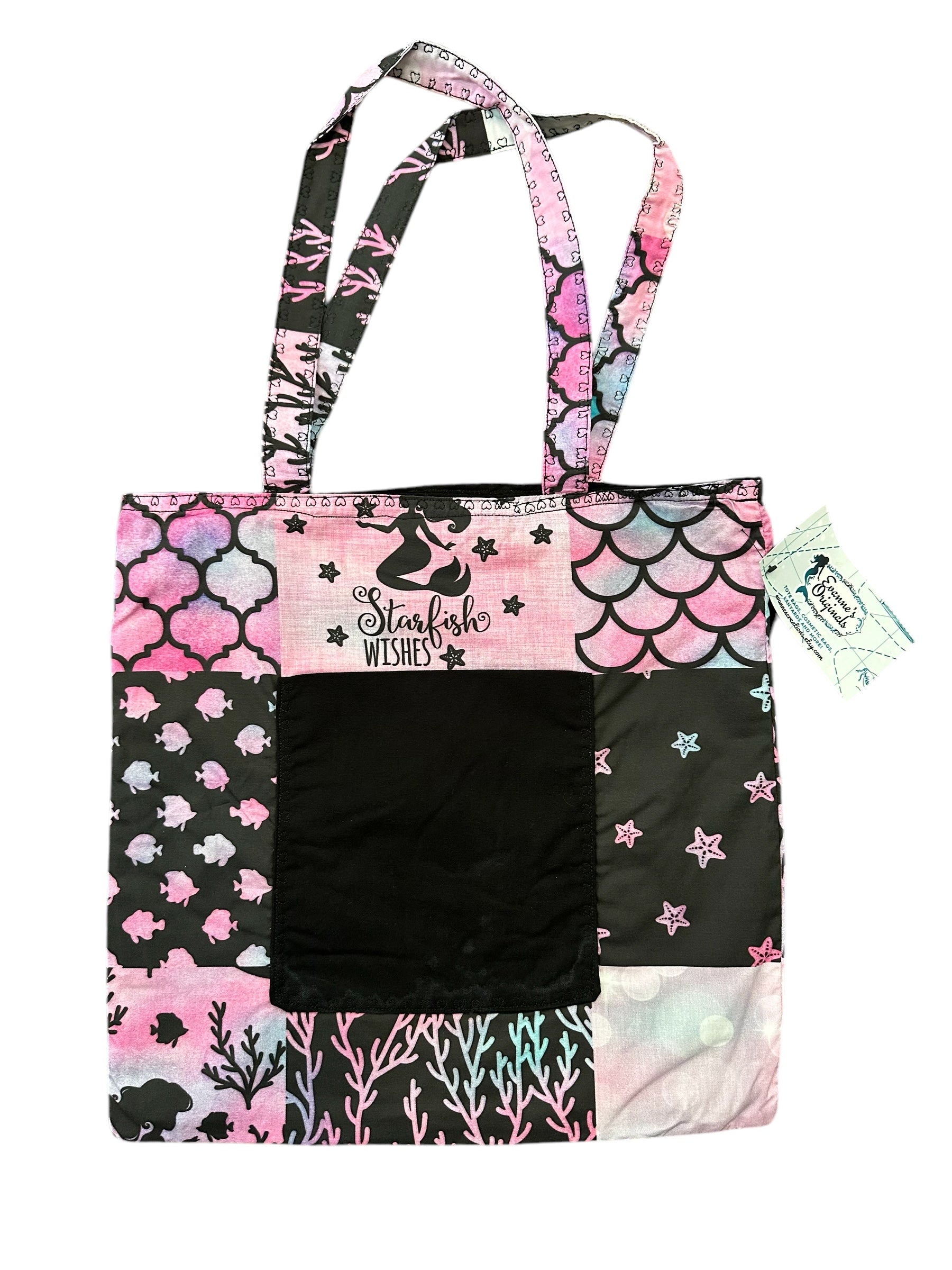 Tote bag with mermaid and starfish patterns on a white background