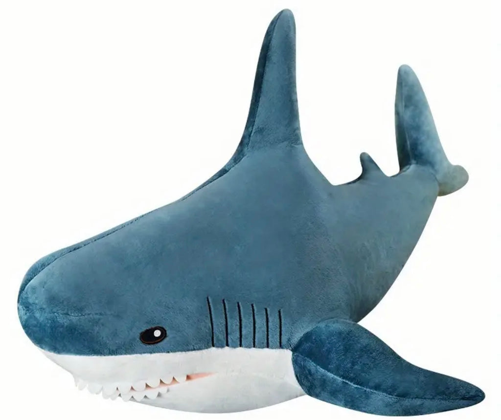 Plush shark toy on a white background