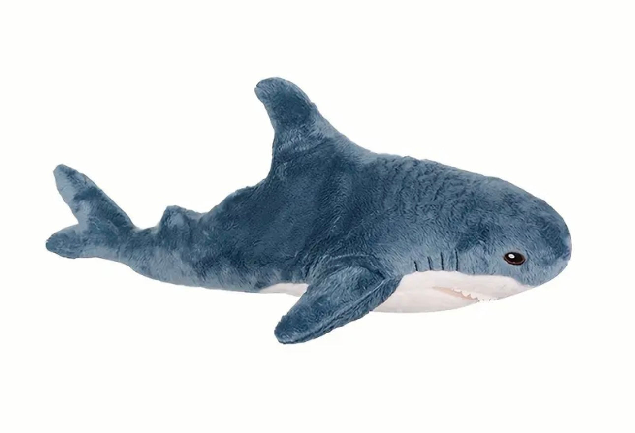 Plush shark toy on a white background