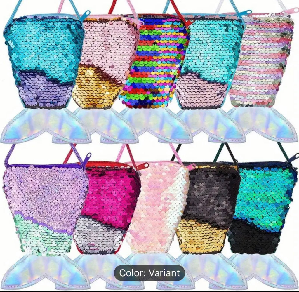 Colorful sequin bags with mermaid tail designs on a white background