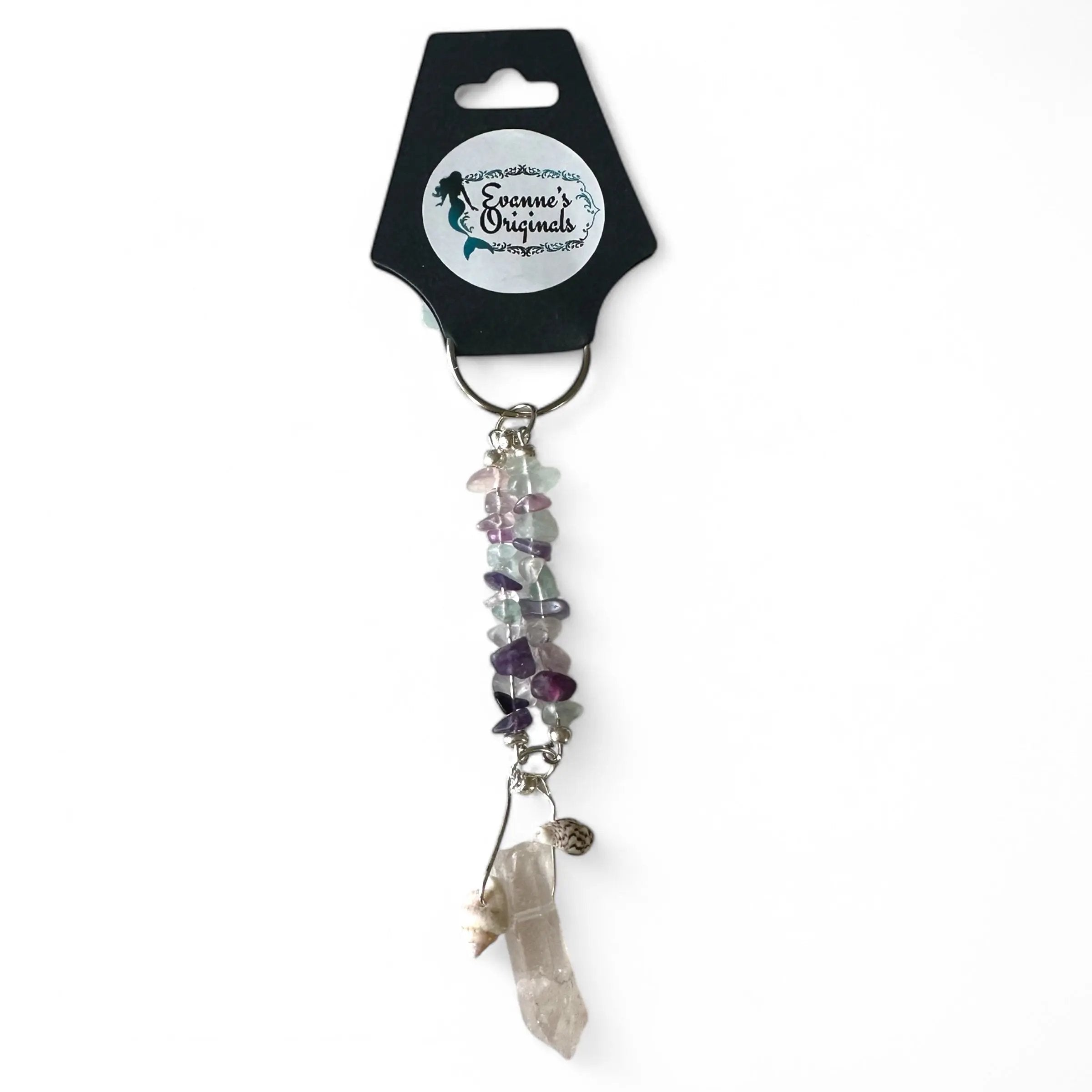 Keychain with multicolored beads and a crystal on a white background
