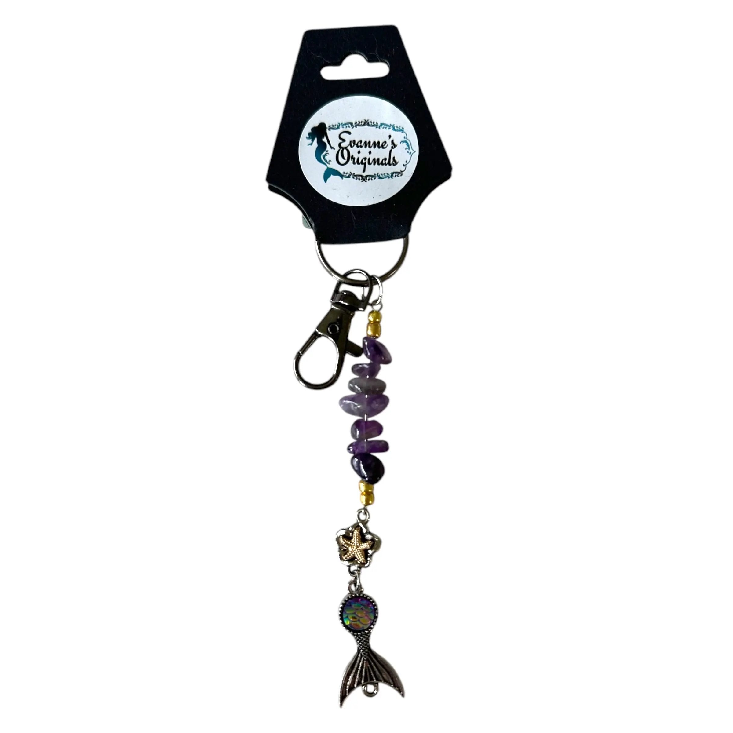 Keychain with mermaid tail design on a white background