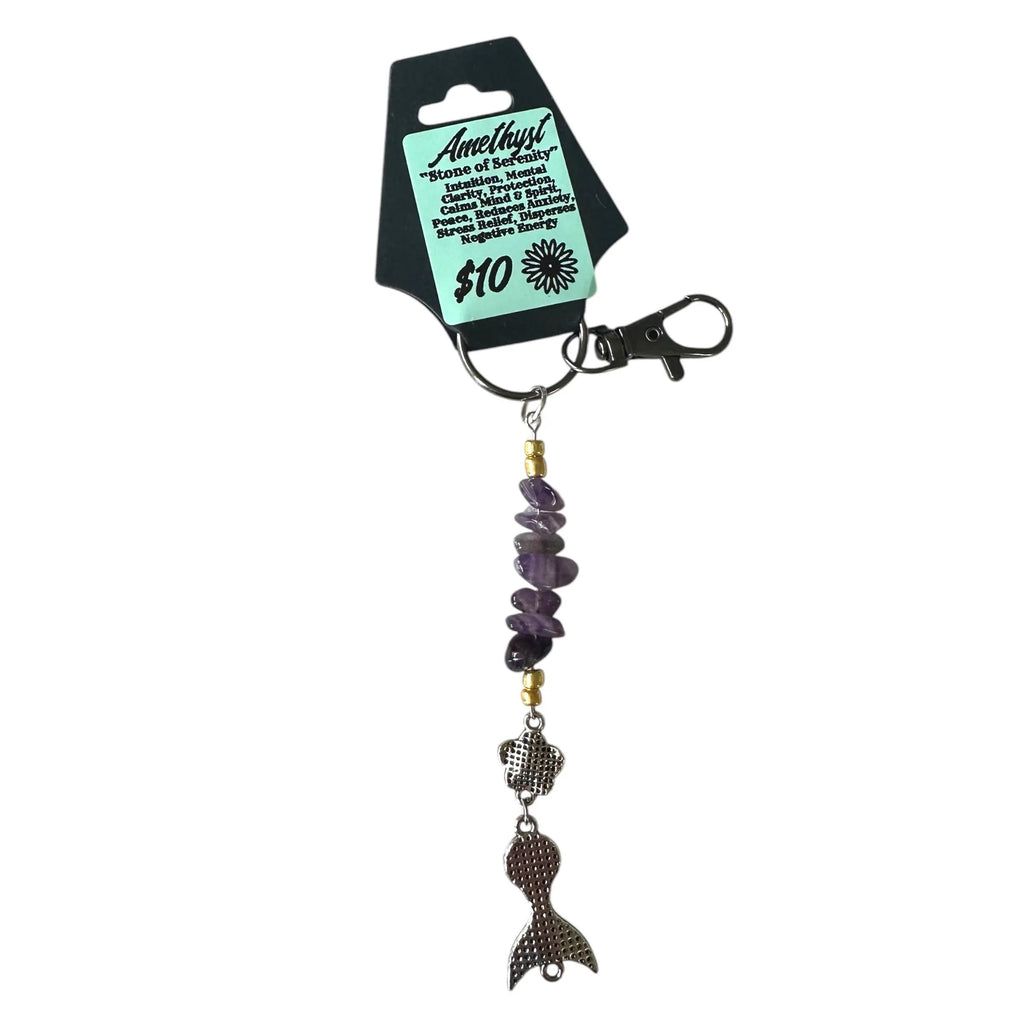 Amethyst keychain with mermaid design on a white background