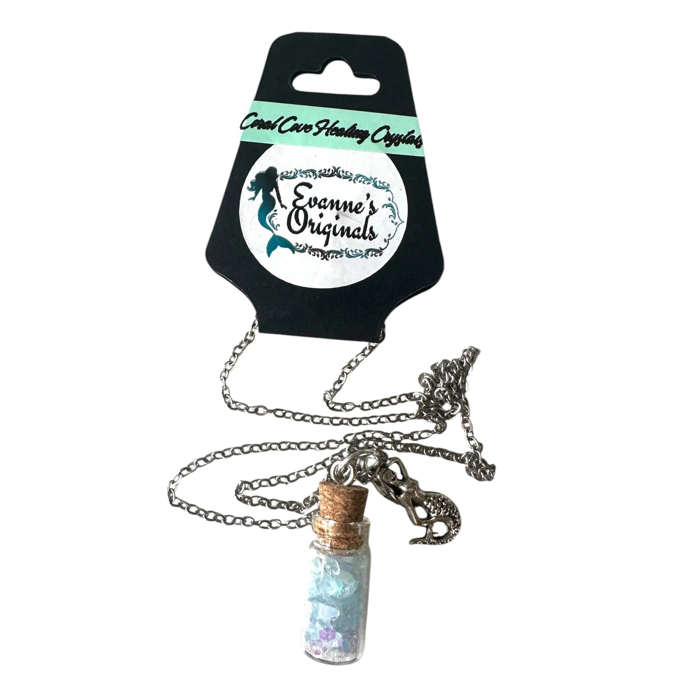 Mermaid-themed necklace in a bottle with packaging labeled 'Evanne's Originals' on a white background