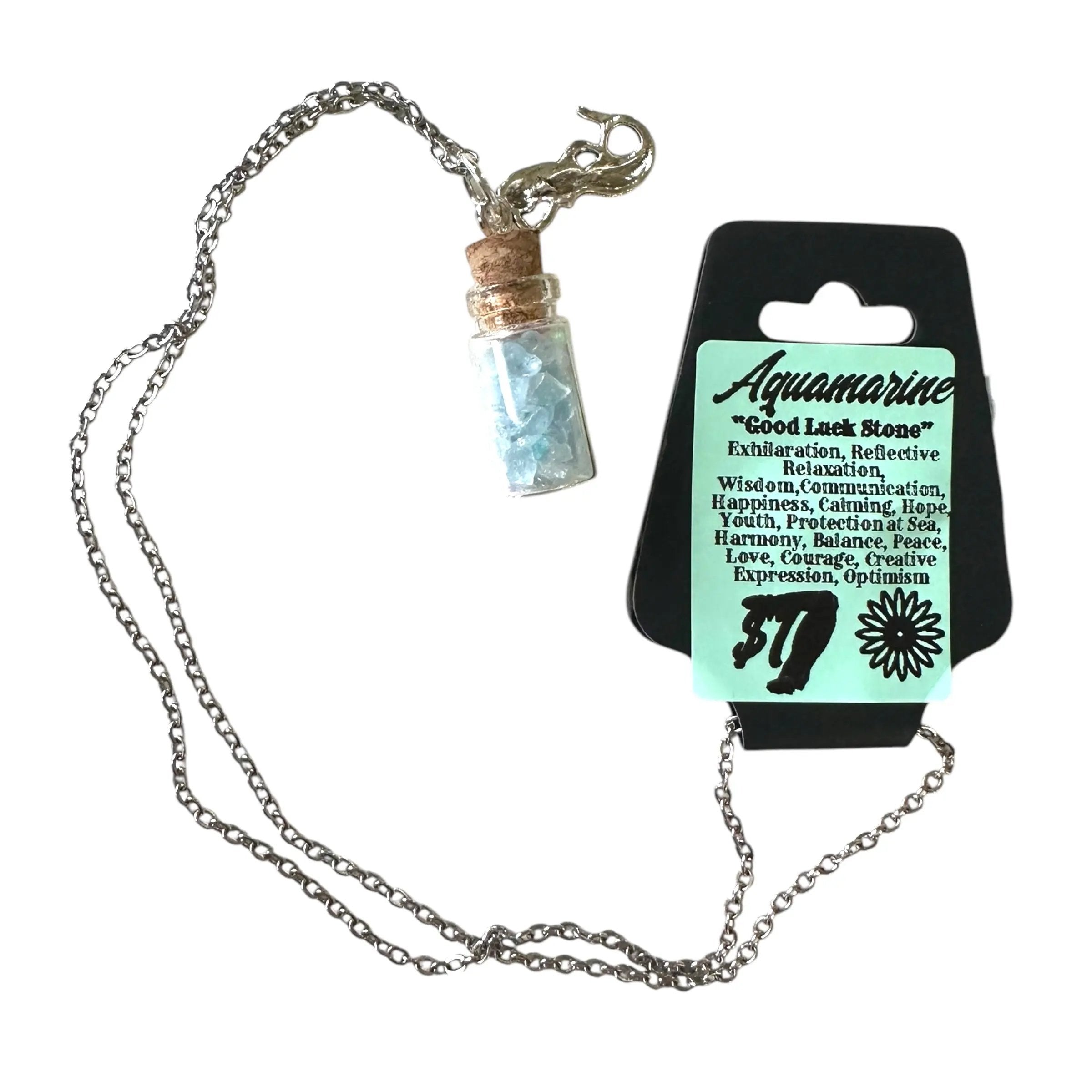 Necklace with a vial of Aquamarine stone and its card on a white background